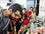 Preparing Japanese-style pancake with M1 students